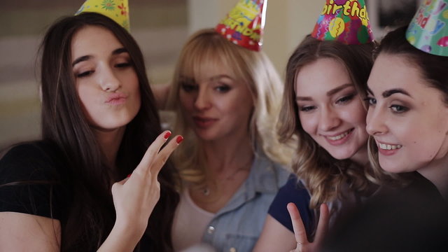happy girls make self caps on birthday