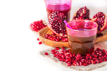 pomegranate juice  and ripe red pomegranate