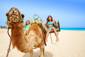 Girls riding Camel in Canary Islands