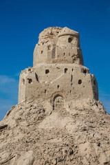 Sand castle on the beach. Ruins, closeup