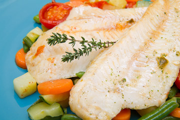 fresh cod on bed of mixed vegetables