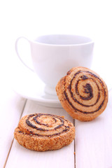 Cookies with poppy seeds and a glass of milk