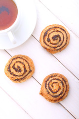 Cookies with poppy seeds and a glass of milk