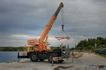 Mobile crane in yacht service in Rovinj in Croatia.