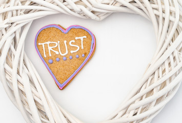 Heart shaped gingerbread. Gray/white background. Valentines day symbol