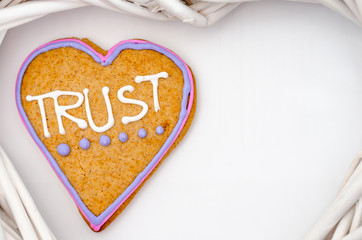 Heart shaped gingerbread. Gray/white background. Valentines day symbol