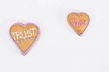 Heart shaped gingerbread. Gray/white background. Valentines day symbol