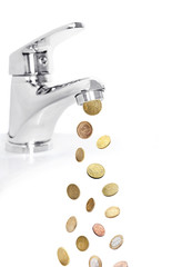 Money fall out of the tap isolated on white