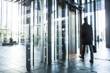 People coming and going a modern office building
