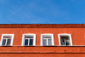 Orange Building and Windows and Sky