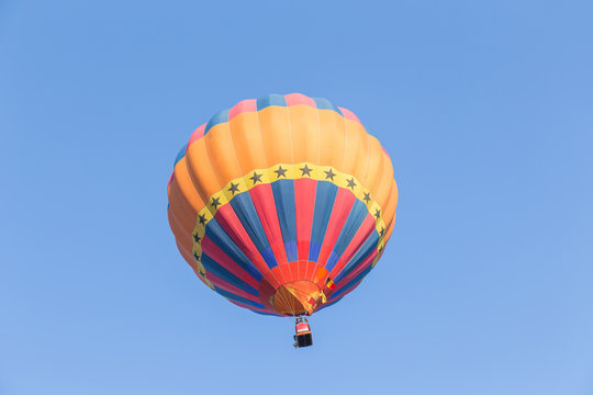 Colorful hot air balloon on blue sky
