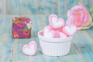 Valentine candies on color wood.selective focus.