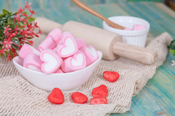 Fototapeta na wymiar Colorful sweet marshmallow in a white-ware