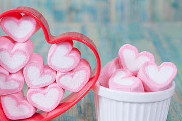 heart shaped candies on background,selective focus.