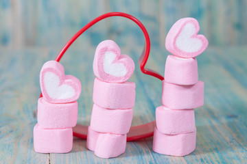 heart shaped candies on background,selective focus.