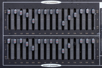Old equalizer audio sound mixer control panel.