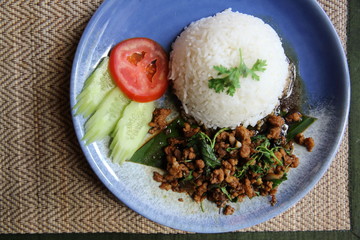 Thai local food rice with pork and basil
