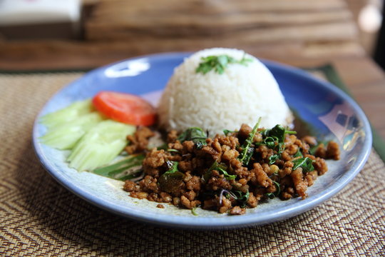 Thai local food rice with pork and basil