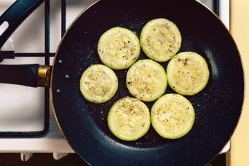 Fried zucchini slices prepared on a pan
