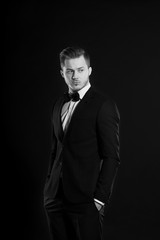 Studio portrait of a fashion young man wearing a suit