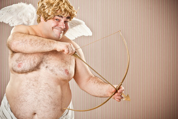 fat blonde cupid with bow and arrow aim for love for Valentine Day