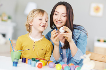 Painting eggs with mom
