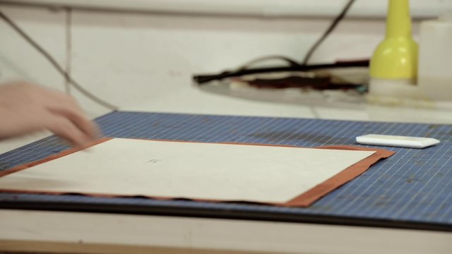 Trunk Maker at work in his luxury leather workshop