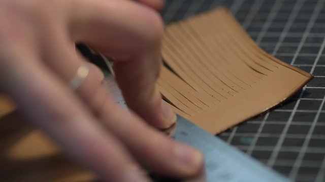 Trunk Maker at work in his luxury leather workshop