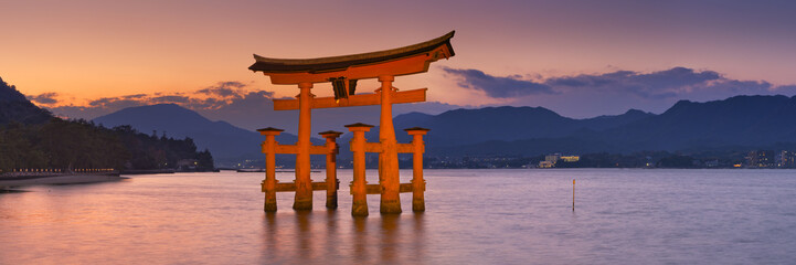 Miyajima torii gate near Hiroshima, Japan at sunset