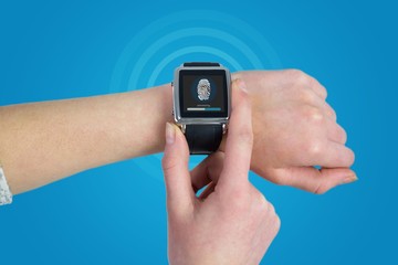 Composite image of woman using smartwatch