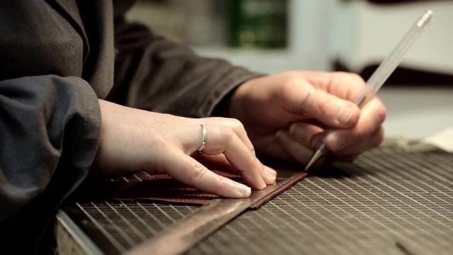 Trunk Maker at work in his luxury leather workshop