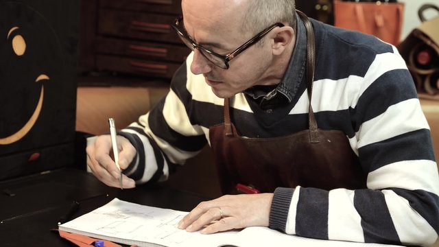 Trunk Maker at work in his luxury leather workshop