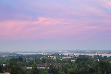 Obraz premium Big bridge over river and panoramic view of city in summer 