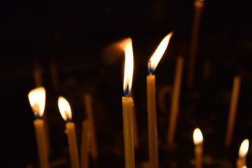 Monastery burning candles