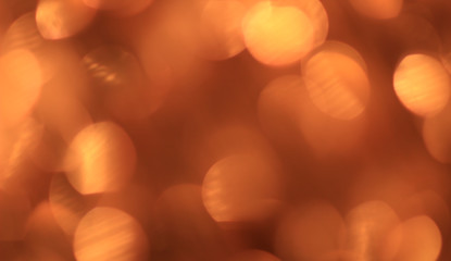 Festive gold background with bokeh effect