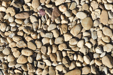 round light brown pebbles texture background