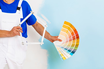 color palette and a yardstick shaped as an house © guerrieroale