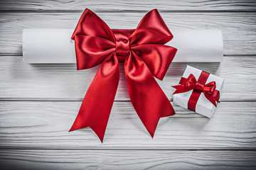 Paper roll with red bow present box holidays concept