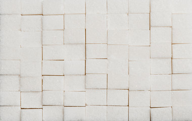 white lump sugar in cubes texture background