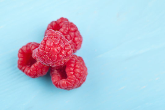 Rasberrys on a wooden table