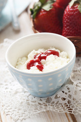 Fresh cottage cheese with strawberry sauce