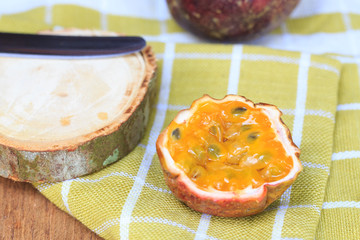 Passion fruit on wooden background