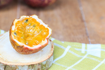 Passion fruit on wooden background