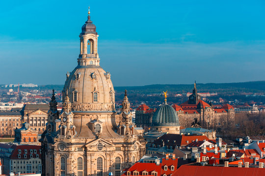 Aerial view over Frauenkirche and glass dome of Academy of Fine Arts or Lemon Squeezer and roofs of old Dresden, Saxony, Germany