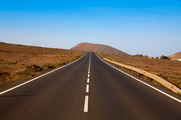 Fototapeta na wymiar Tindaya road with mountain Fuerteventura
