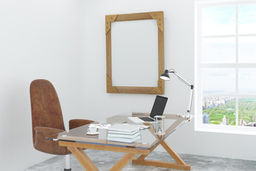 Blank wooden picture frame in sunny office with glassy table and