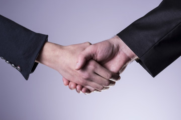 two hands handshake contract