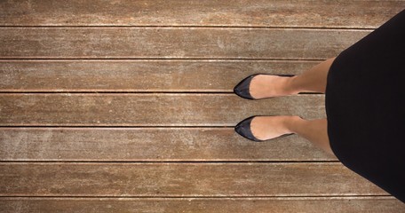 Composite image of businesswomans feet