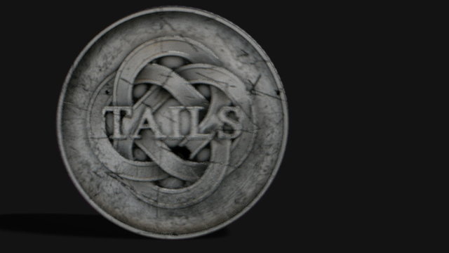 A worn antique silver coin with a heads and tails side spinning on a dark background