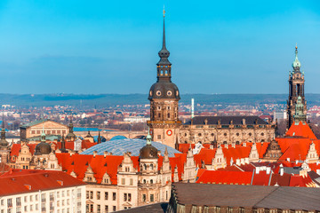 Aerial view over Royal Palace, river Elbe with Augustus Bridge, Hofkirche, and roofs of old Dresden, Saxony, Germany